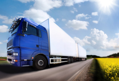 truck driving on country-road/motion